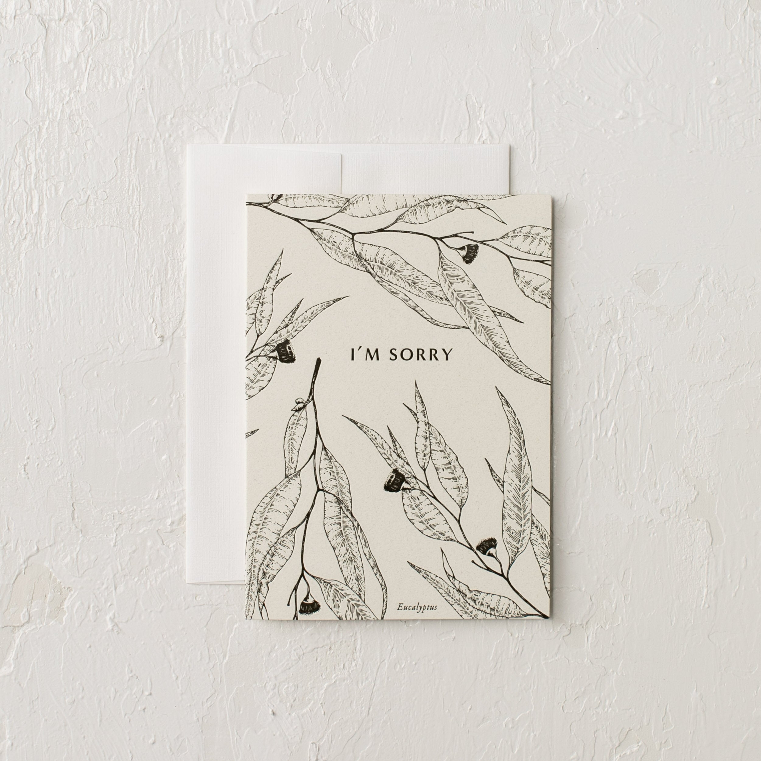 Letter pressed greeting card - "I'm Sorry" surrounded by Eucalyptus. 