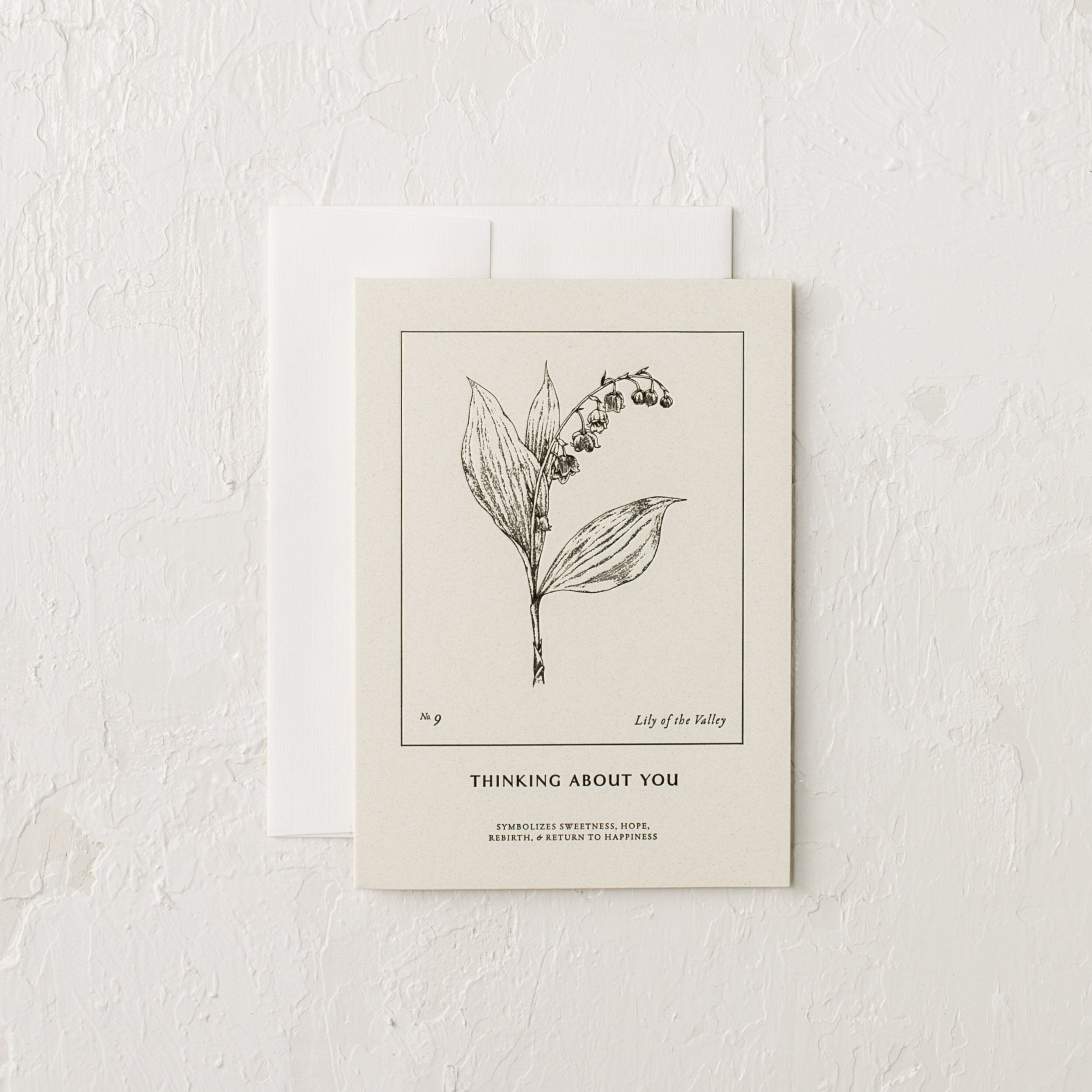 Letter pressed greeting card with a botanical illustrated Lily of the Valley, "Thinking About You" - Symbolizes sweetness, hope, rebirth and return to happiness." Designed and sold by Verdant, Kansas City.  