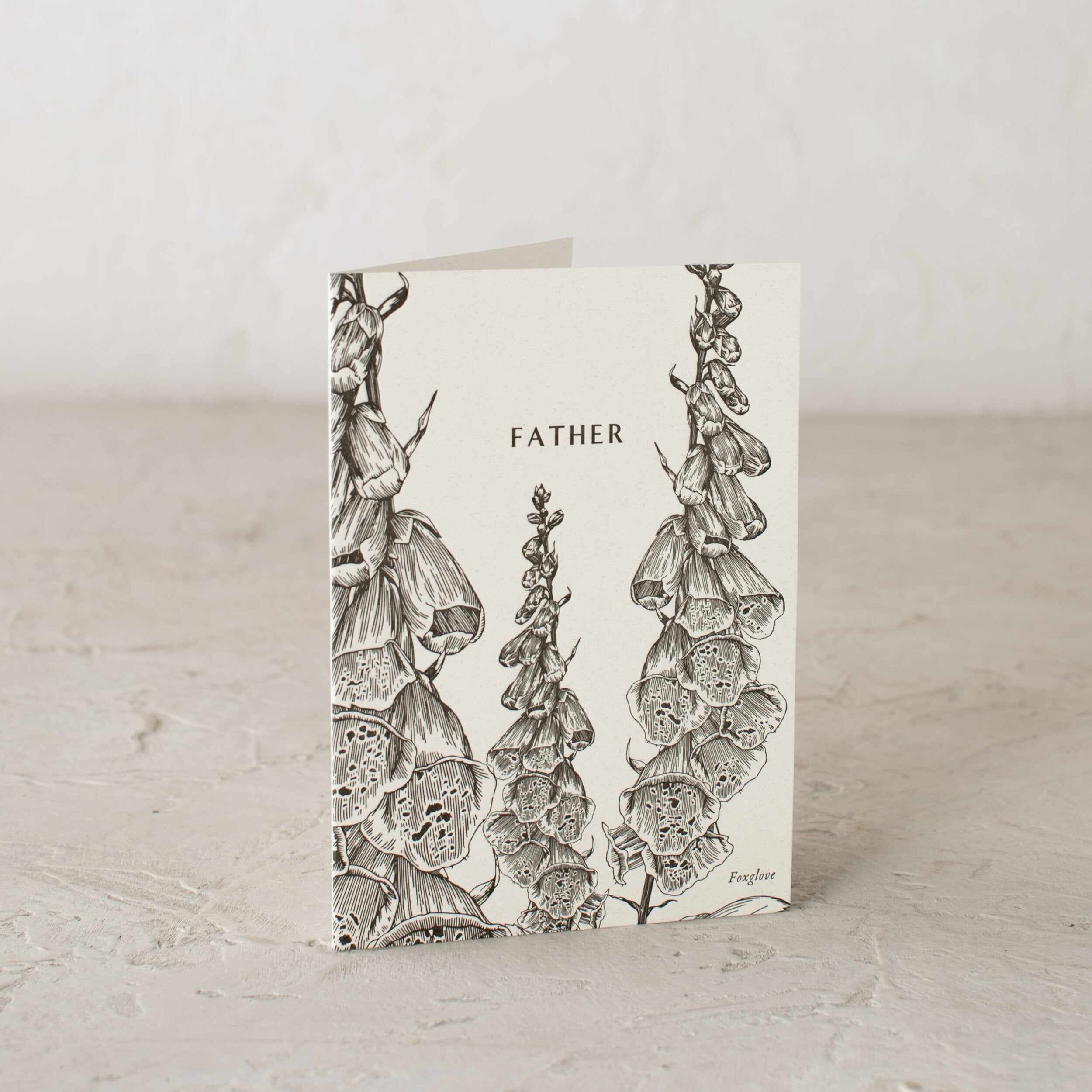 Letter-pressed botanical greeting card. Fox glove illustration labeled "Father"